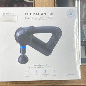 Therabody Theragun Elite Percussive Device - Black and Blue. New, in Plastic Wra